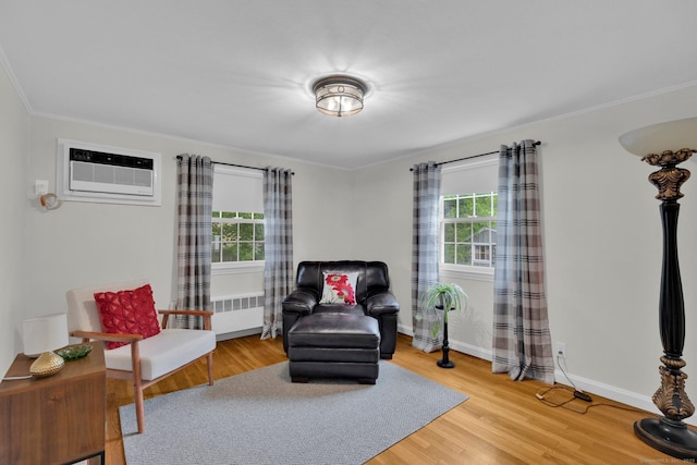 10 Knollwood Rd, Farmington, CT 06032 - living area featuring healthy amount of natural light, light wood-type flooring, crown molding, and baseboards