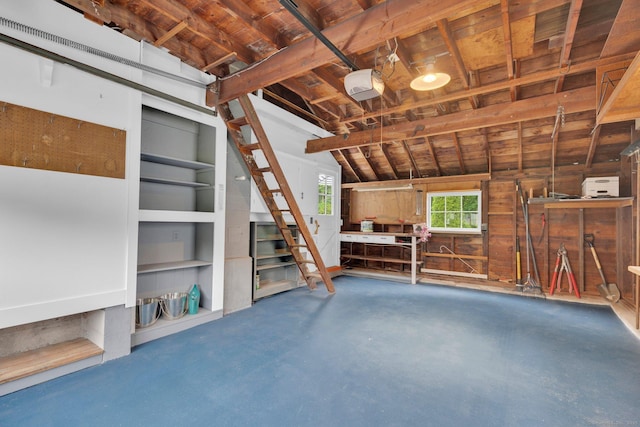 10 Knollwood Rd, Farmington, CT 06032 - garage featuring wood walls and a garage door opener