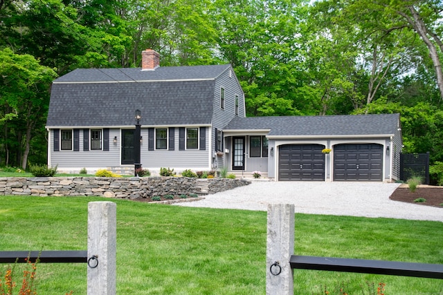586 Essex Rd, Westbrook, CT 06498 - colonial inspired home featuring roof with shingles, gravel driveway, a chimney, a gambrel roof, and a front lawn
