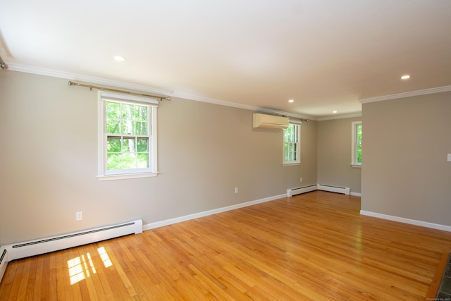 586 Essex Rd, Westbrook, CT 06498 - spare room with a wall unit AC, ornamental molding, plenty of natural light, light wood finished floors, and baseboards