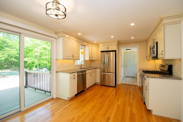 586 Essex Rd, Westbrook, CT 06498 - kitchen with appliances with stainless steel finishes, a sink, plenty of natural light, light wood-style flooring, and recessed lighting