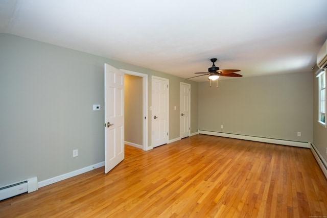 586 Essex Rd, Westbrook, CT 06498 - empty room with a baseboard heating unit, ceiling fan, light wood finished floors, a baseboard radiator, and baseboards