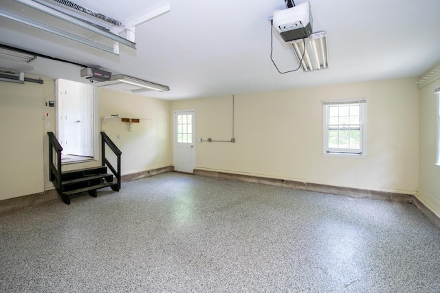586 Essex Rd, Westbrook, CT 06498 - garage featuring a garage door opener