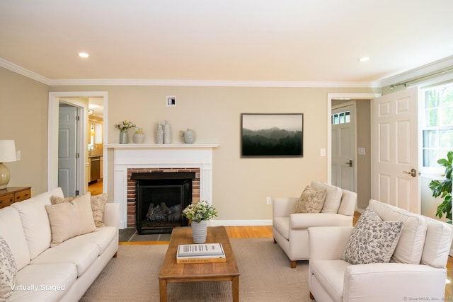 586 Essex Rd, Westbrook, CT 06498 - living area featuring ornamental molding, light wood-type flooring, a fireplace, recessed lighting, and baseboards