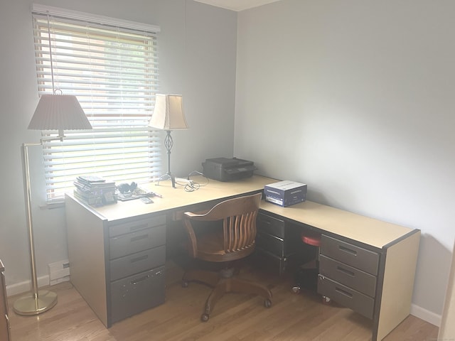 433 Garden St, Hartford, CT 06112 - home office with light wood finished floors, healthy amount of natural light, and built in study area