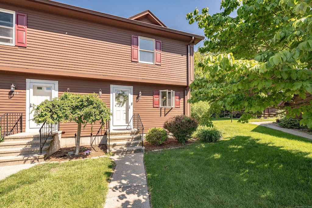 104 Candlewood Dr Unit 104, Enfield, CT 06082 - view of front of house with a front lawn and entry steps