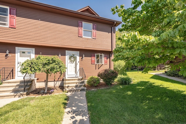 104 Candlewood Dr Unit 104, Enfield, CT 06082 - view of front of house with a front lawn and entry steps
