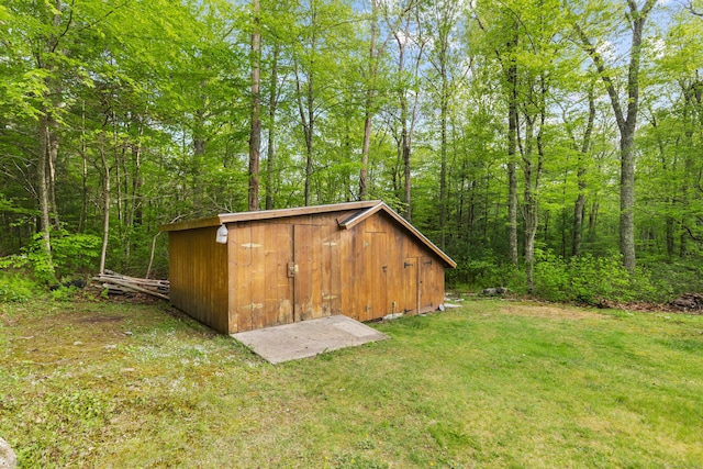 654 Beach Pond Rd, Voluntown, CT 06384 - view of shed featuring a forest view
