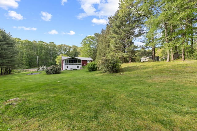 654 Beach Pond Rd, Voluntown, CT 06384 - view of grassy yard featuring a forest view