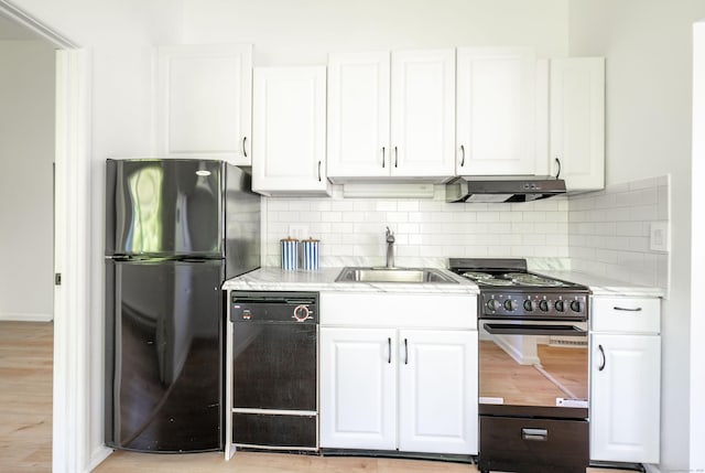 4 Farview Ave Unit 1-10, Danbury, CT 06810 - kitchen featuring black appliances, a sink, under cabinet range hood, white cabinetry, and backsplash