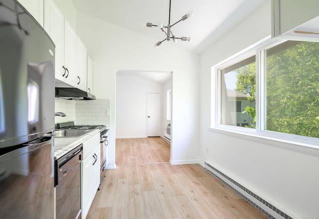 4 Farview Ave Unit 1-10, Danbury, CT 06810 - kitchen featuring freestanding refrigerator, a baseboard radiator, dishwashing machine, lofted ceiling, and a chandelier