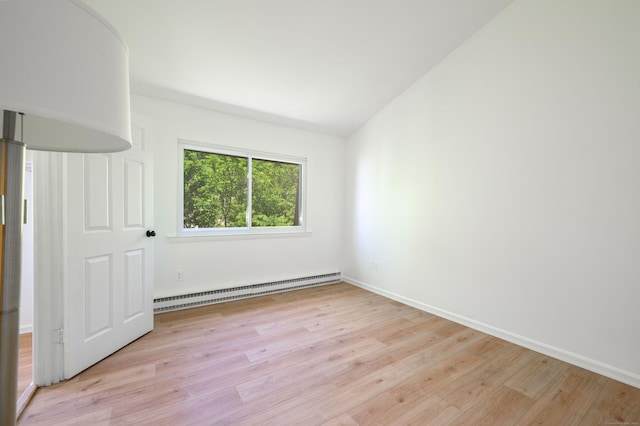 4 Farview Ave Unit 1-10, Danbury, CT 06810 - unfurnished room featuring baseboard heating, light wood-style floors, baseboards, and vaulted ceiling
