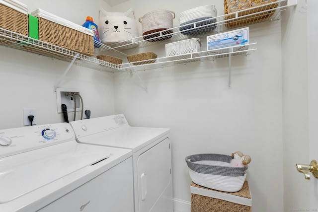 44 Village Ct Unit 44, Wilton, CT 06897 - laundry room featuring washing machine and dryer and baseboards
