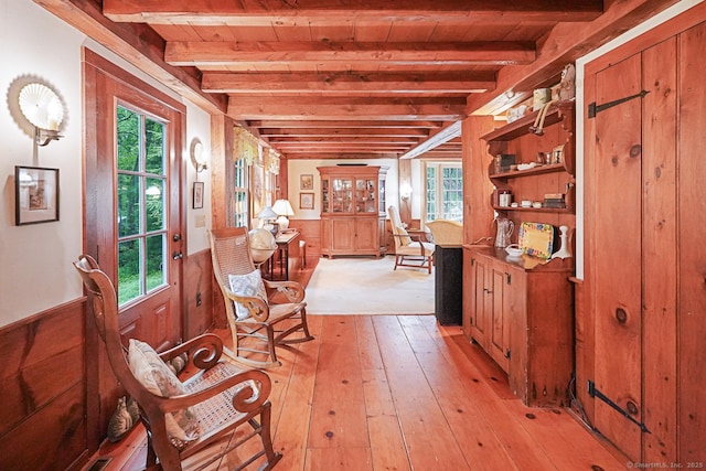 9 Pheasant Ln, Brooklyn, CT 06234 - interior space featuring light wood-style floors, plenty of natural light, wooden ceiling with exposed beams, and a wainscoted wall