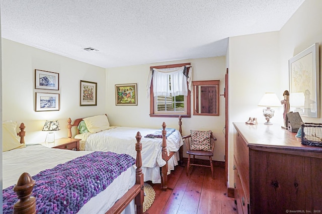 9 Pheasant Ln, Brooklyn, CT 06234 - bedroom featuring a textured ceiling and hardwood / wood-style floors