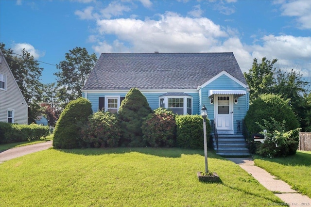 185 Hooker Rd, Bridgeport, CT 06610 - cape cod house with roof with shingles and a front lawn