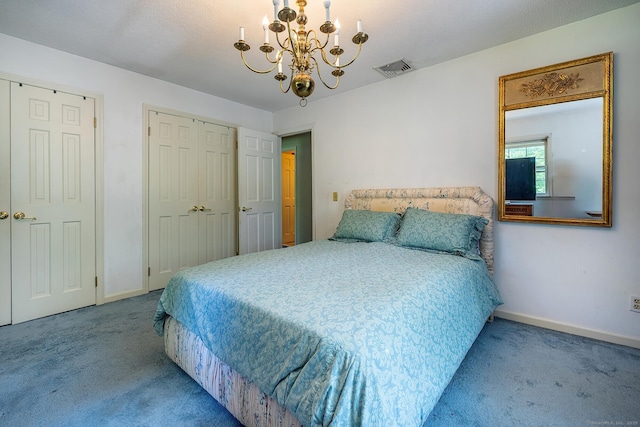 9 Meadowbrook Rd, New Fairfield, CT 06812 - carpeted bedroom featuring a chandelier, baseboards, and multiple closets
