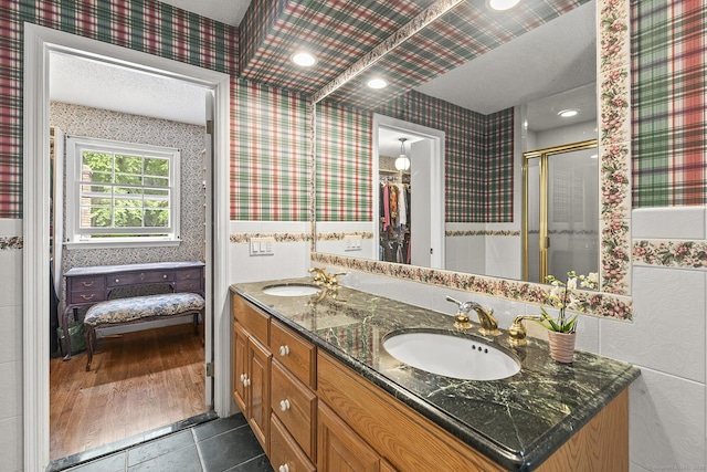 9 Meadowbrook Rd, New Fairfield, CT 06812 - bathroom featuring double vanity, a shower stall, and tile patterned flooring