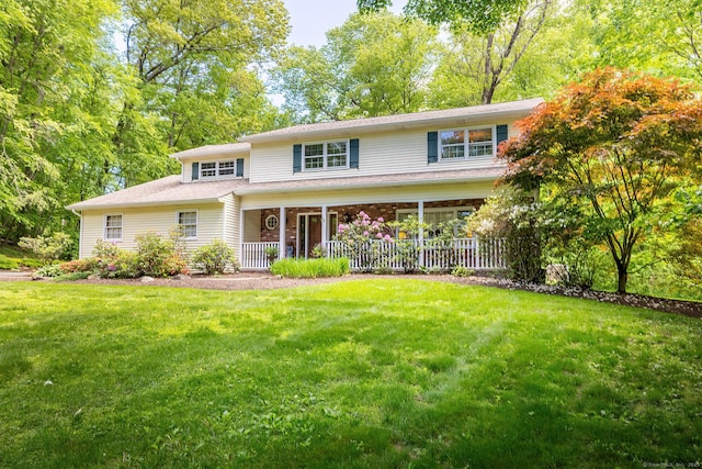 9 Meadowbrook Rd, New Fairfield, CT 06812 - view of front facade with a front yard and covered porch