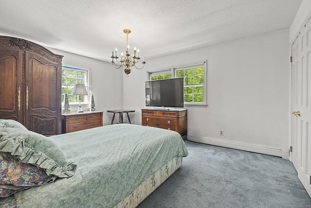 9 Meadowbrook Rd, New Fairfield, CT 06812 - bedroom with a chandelier, carpet flooring, a baseboard heating unit, a textured ceiling, and baseboards