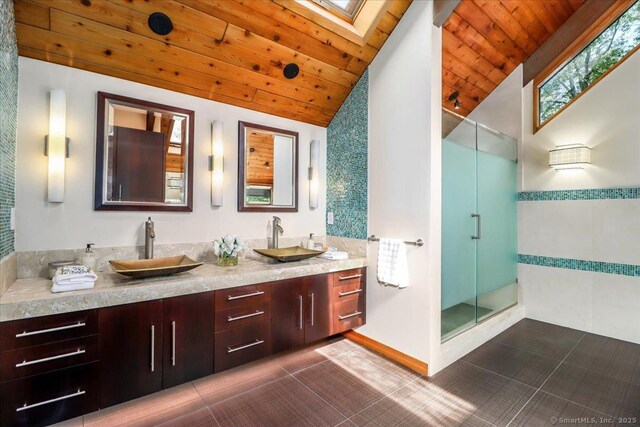 93 Graenest Ridge Rd, Wilton, CT 06897 - bathroom featuring double vanity, wood ceiling, a stall shower, a skylight, and high vaulted ceiling