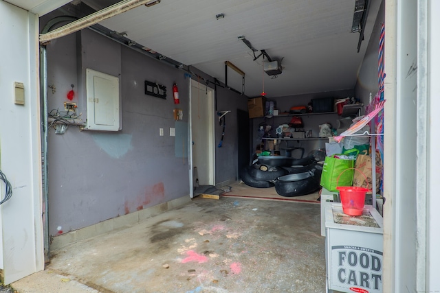95 Park Ave Apt 14, Danbury, CT 06810 - garage featuring electric panel and a garage door opener