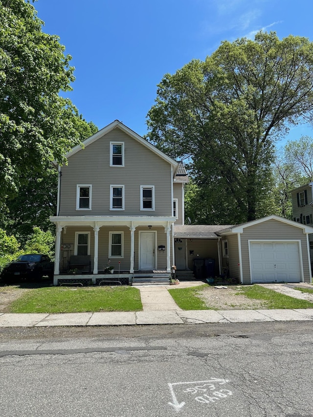 59 Rowan St, Danbury, CT 06810 - view of front of property with covered porch and an attached garage