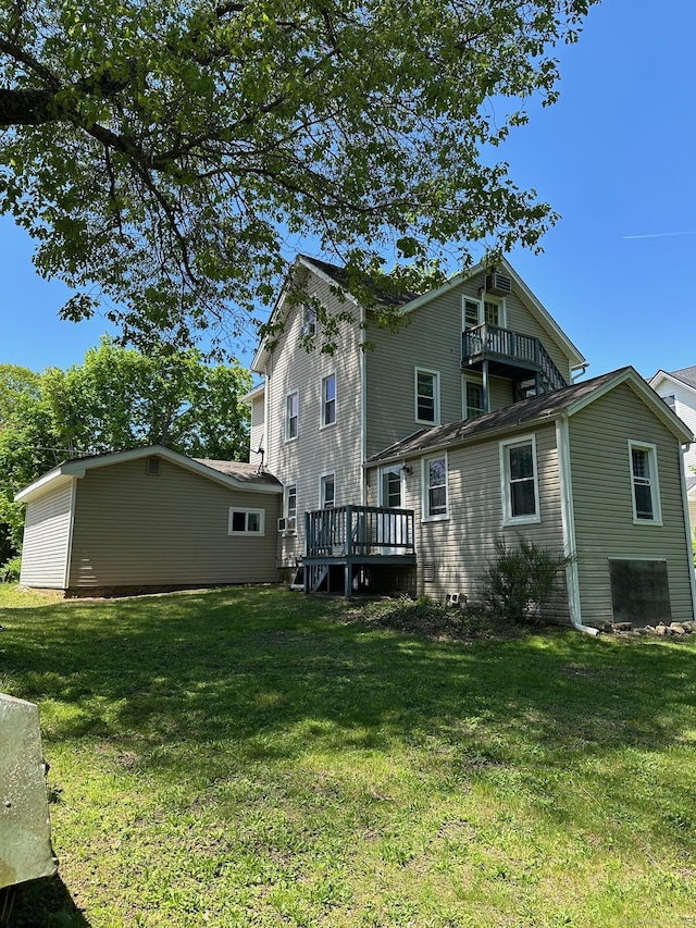 59 Rowan St, Danbury, CT 06810 - rear view of property featuring a lawn, a deck, and a balcony