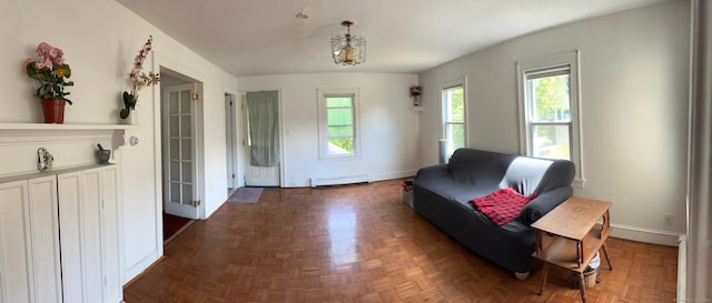 59 Rowan St, Danbury, CT 06810 - sitting room featuring baseboard heating and baseboards