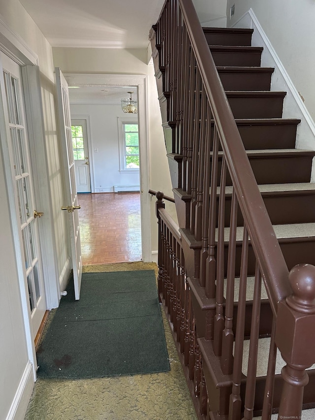 59 Rowan St, Danbury, CT 06810 - staircase featuring baseboards and a baseboard radiator
