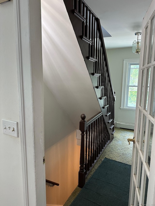 59 Rowan St, Danbury, CT 06810 - stairway featuring a baseboard radiator and french doors