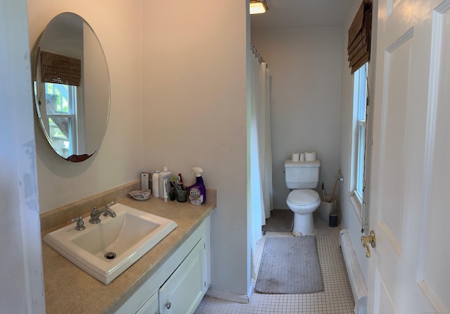 59 Rowan St, Danbury, CT 06810 - bathroom featuring vanity, toilet, tile patterned floors, a baseboard heating unit, and a shower with curtain