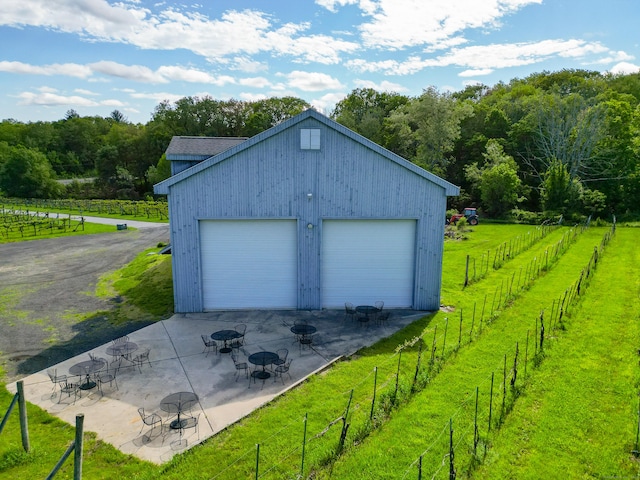 1480 Litchfield Tpke, New Hartford, CT 06057 - detached garage featuring a view of trees