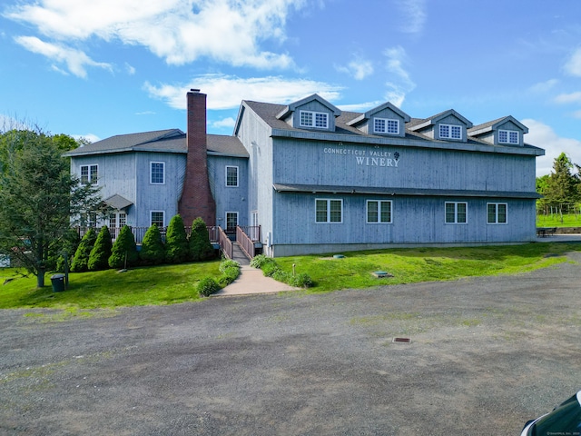 1480 Litchfield Tpke, New Hartford, CT 06057 - view of side of home with a lawn and a chimney