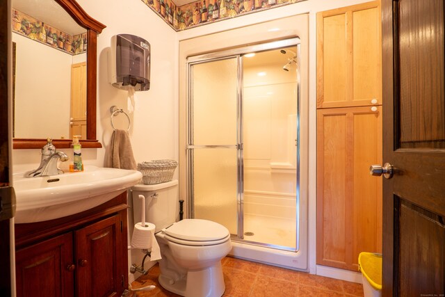 1480 Litchfield Tpke, New Hartford, CT 06057 - full bathroom featuring a stall shower, vanity, toilet, and tile patterned flooring