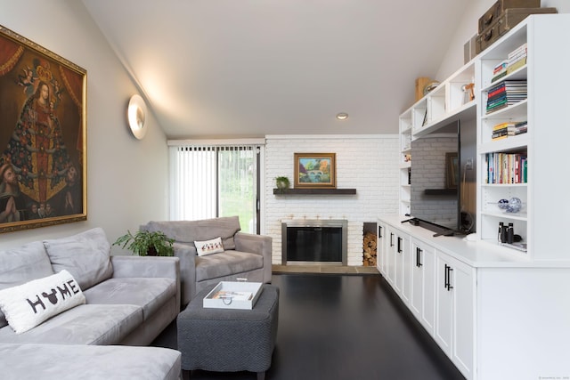 504 Harvest Commons Unit 504, Westport, CT 06880 - living room with a brick fireplace and lofted ceiling