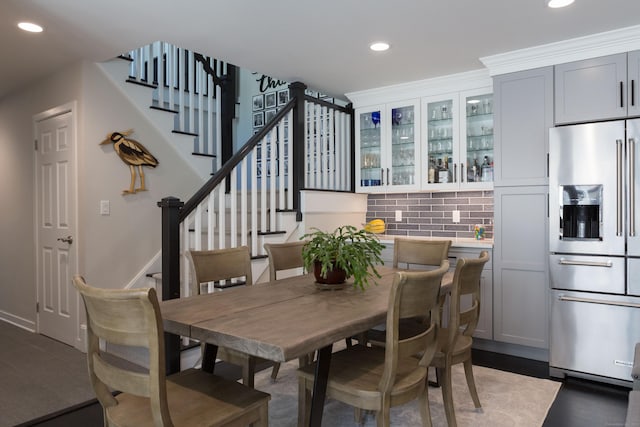 504 Harvest Commons Unit 504, Westport, CT 06880 - dining area with stairs and recessed lighting