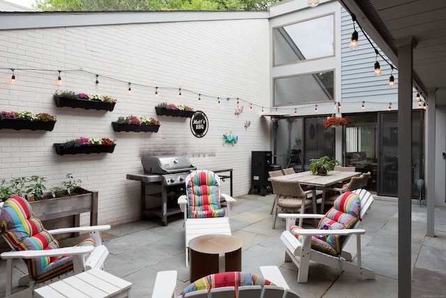 504 Harvest Commons Unit 504, Westport, CT 06880 - view of patio featuring outdoor dining area and grilling area