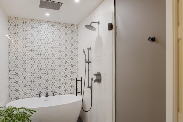 504 Harvest Commons Unit 504, Westport, CT 06880 - bathroom with a shower stall, a freestanding bath, and recessed lighting