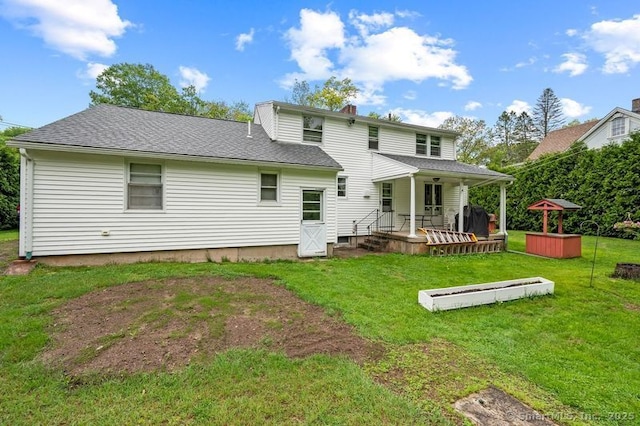 45 S Eagle St, Plymouth, CT 06786 - rear view of house with covered porch, a yard, a chimney, and roof with shingles