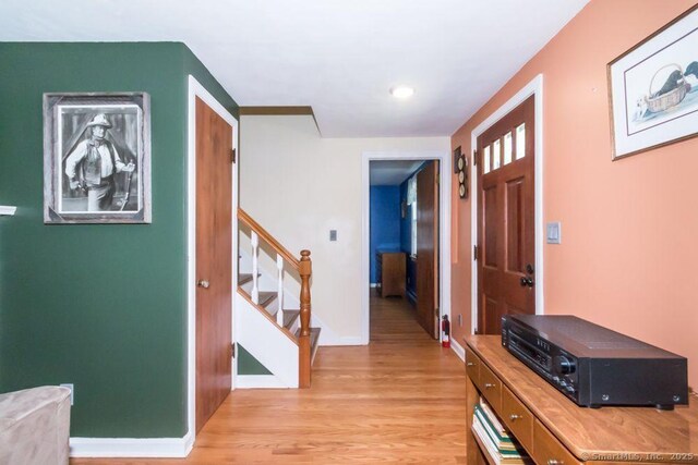 45 S Eagle St, Plymouth, CT 06786 - foyer entrance featuring light wood-style floors, stairway, baseboards, and recessed lighting