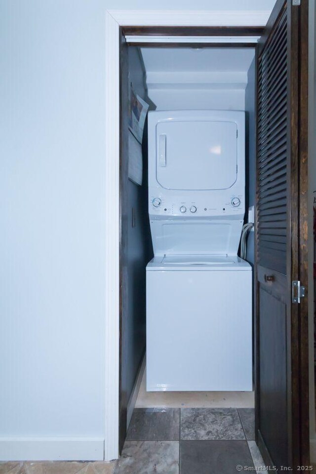 45 S Eagle St, Plymouth, CT 06786 - washroom with stacked washing machine and dryer and baseboards