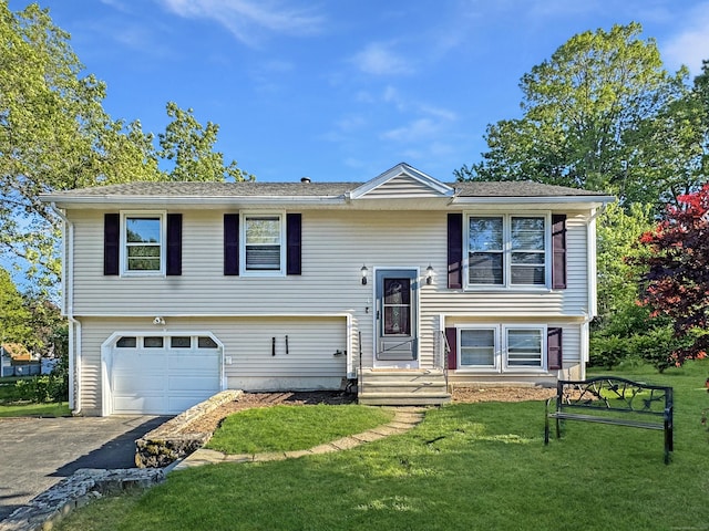 4 Hemlock Rd, Naugatuck, CT 06770 - raised ranch featuring driveway, an attached garage, a front yard, and entry steps