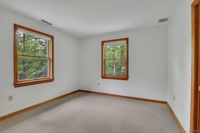 1155 Arbutus St, Middletown, CT 06457 - carpeted empty room with baseboards