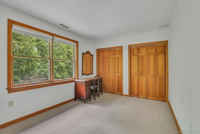 1155 Arbutus St, Middletown, CT 06457 - home office featuring healthy amount of natural light, baseboards, and light colored carpet