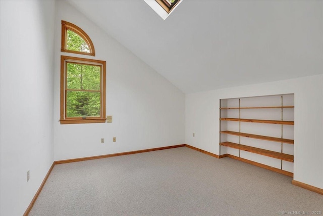 1155 Arbutus St, Middletown, CT 06457 - additional living space with carpet floors, lofted ceiling, baseboards, and a skylight
