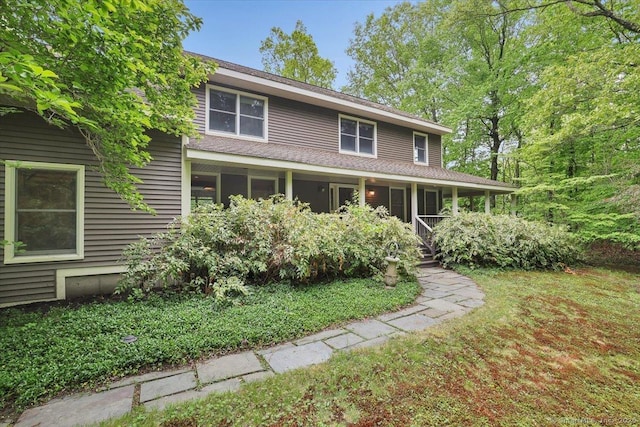1155 Arbutus St, Middletown, CT 06457 - view of front of house with covered porch and a front yard