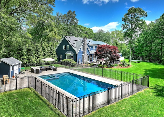10 Grove Hill Rd, Woodbridge, CT 06525 - view of pool with outdoor lounge area, a pool with connected hot tub, and view of wooded area