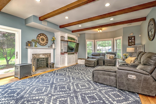 10 Grove Hill Rd, Woodbridge, CT 06525 - living room with wood finished floors, recessed lighting, a premium fireplace, and beam ceiling