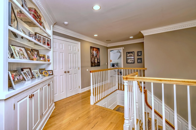 10 Grove Hill Rd, Woodbridge, CT 06525 - hallway with an upstairs landing, recessed lighting, light wood finished floors, and crown molding